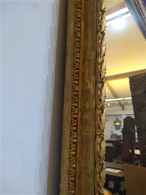 Lot 13 - A large pair of carved and gilded picture frames