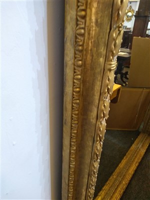 Lot 13 - A large pair of carved and gilded picture frames