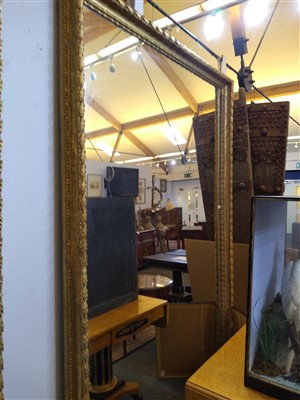 Lot 13 - A large pair of carved and gilded picture frames