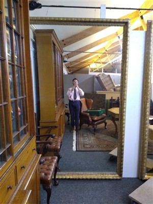 Lot 13 - A large pair of carved and gilded picture frames