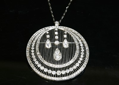 Lot 197 - A Continental Belle Époque diamond set crescent brooch/pendant, c.1915