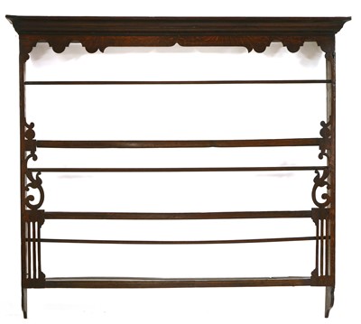 Lot 347 - An oak wall hanging delft rack