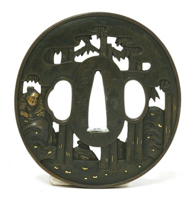 Lot 214 - A Japanese Soten School Shakudo tsuba
