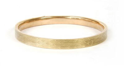 Lot 50 - A 9ct gold hollow bangle