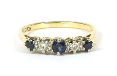 Lot 18 - A graduated five stone sapphire and diamond ring