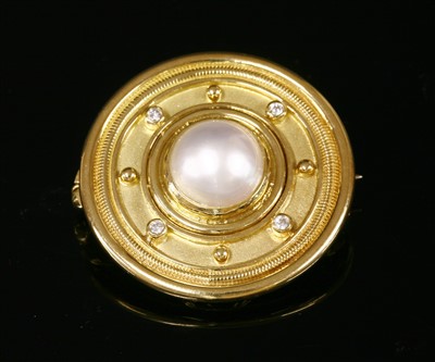 Lot 284 - An 18ct gold mabé pearl and diamond brooch