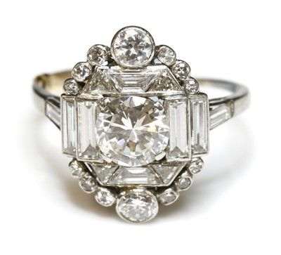 Lot 167 - An Art Deco diamond set plaque-style cluster ring