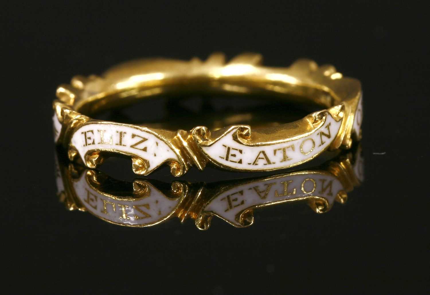 Lot 4 - A Georgian white enamel memorial ring