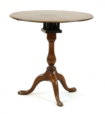 Lot 569 - A mahogany tripod table