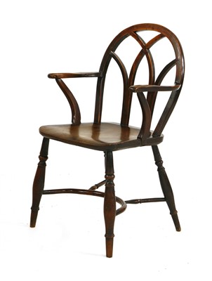 Lot 321 - A yew and elm Gothic-type Windsor chair