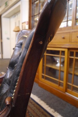 Lot 143 - A pair of mahogany library armchairs