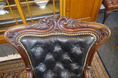 Lot 143 - A pair of mahogany library armchairs