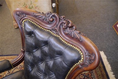 Lot 143 - A pair of mahogany library armchairs
