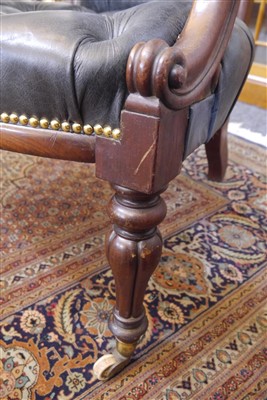 Lot 143 - A pair of mahogany library armchairs