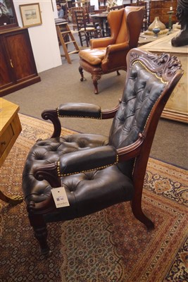 Lot 143 - A pair of mahogany library armchairs
