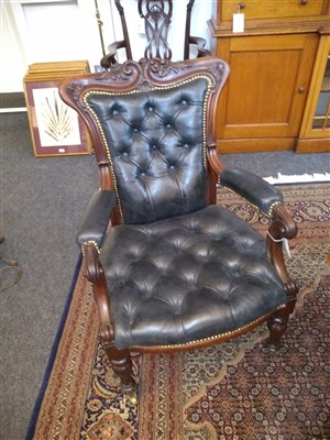Lot 143 - A pair of mahogany library armchairs