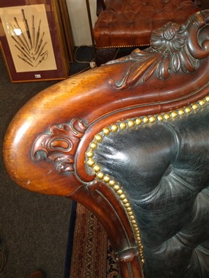Lot 143 - A pair of mahogany library armchairs