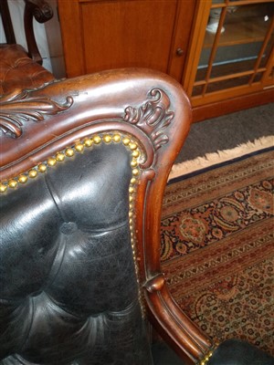 Lot 143 - A pair of mahogany library armchairs