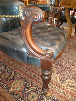 Lot 143 - A pair of mahogany library armchairs