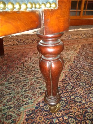Lot 143 - A pair of mahogany library armchairs