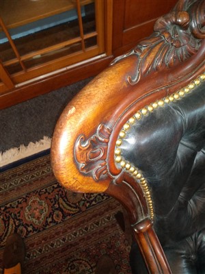 Lot 143 - A pair of mahogany library armchairs