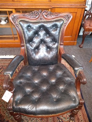 Lot 143 - A pair of mahogany library armchairs
