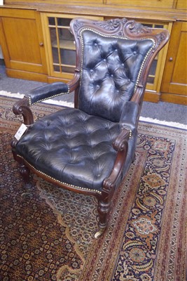 Lot 143 - A pair of mahogany library armchairs