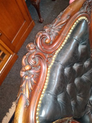 Lot 143 - A pair of mahogany library armchairs