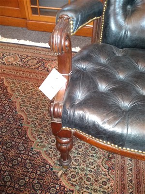 Lot 143 - A pair of mahogany library armchairs