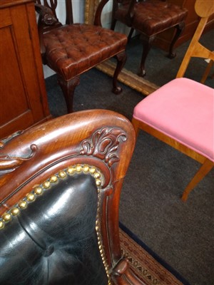 Lot 143 - A pair of mahogany library armchairs