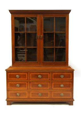 Lot 353 - An Edwardian mahogany and crossbanded library bookcase cabinet
