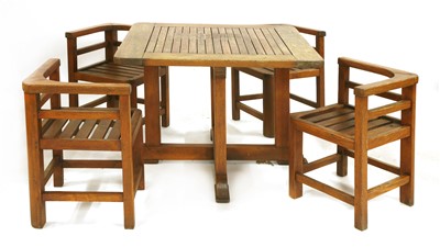 Lot 111 - An Heal's teak garden table and four chairs