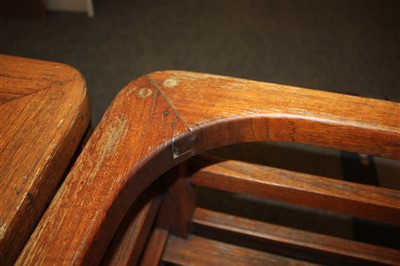 Lot 111 - An Heal's teak garden table and four chairs