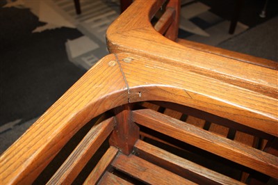 Lot 111 - An Heal's teak garden table and four chairs