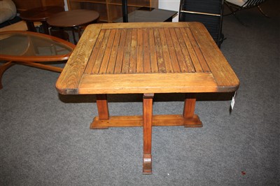 Lot 111 - An Heal's teak garden table and four chairs