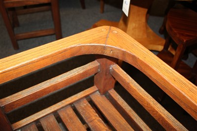 Lot 111 - An Heal's teak garden table and four chairs