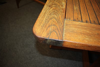 Lot 111 - An Heal's teak garden table and four chairs
