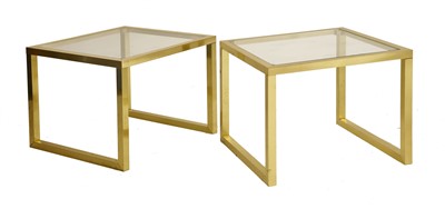 Lot 422 - A pair of brass side tables