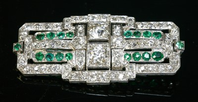 Lot 203 - An Art Deco emerald and diamond plaque brooch, c.1925