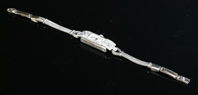 Lot 191 - A ladies' Art Deco diamond set mechanical cocktail watch, c.1925