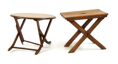 Lot 509 - An Arts and Crafts pitch pine stool on X frame support