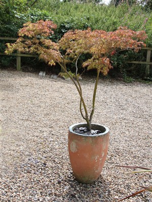 Lot 610 - A large reconstituted stone painted garden planter