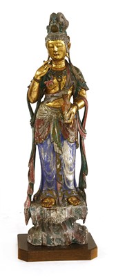 Lot 355 - A Chinese wood Guanyin