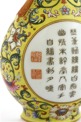 Lot 81 - A Chinese imperial inscribed famille rose wall vase
