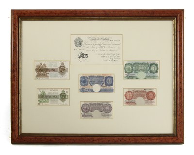 Lot 441 - A framed display of British bank notes
