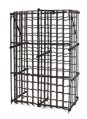 Lot 655 - A French wrought iron wall-mounted wine store