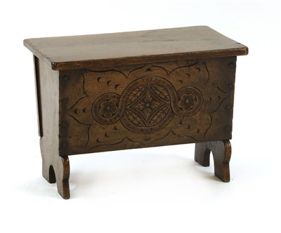 Lot 561 - A miniature oak coffer