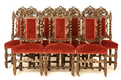 Lot 280 - A set of seven late Victorian carved oak dining chairs