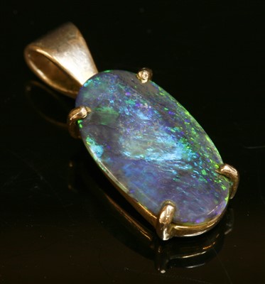 Lot 359 - A silver single stone black opal pendant