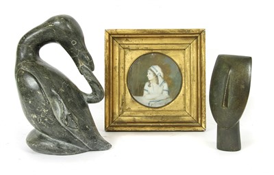 Lot 130 - A miniature portrait of a young woman